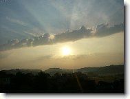 východ slunce Tmaň